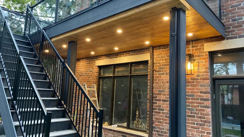 Stunning interlocking driveway with natural stone borders